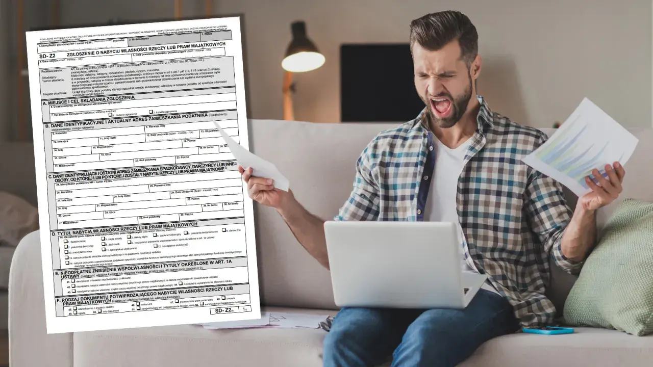 Mężczyzna z wściekłą miną trzyma dokumenty i laptopa, próbując zrozumieć formularz SD-Z2.