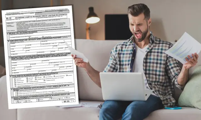 Mężczyzna z wściekłą miną trzyma dokumenty i laptopa, próbując zrozumieć formularz SD-Z2.